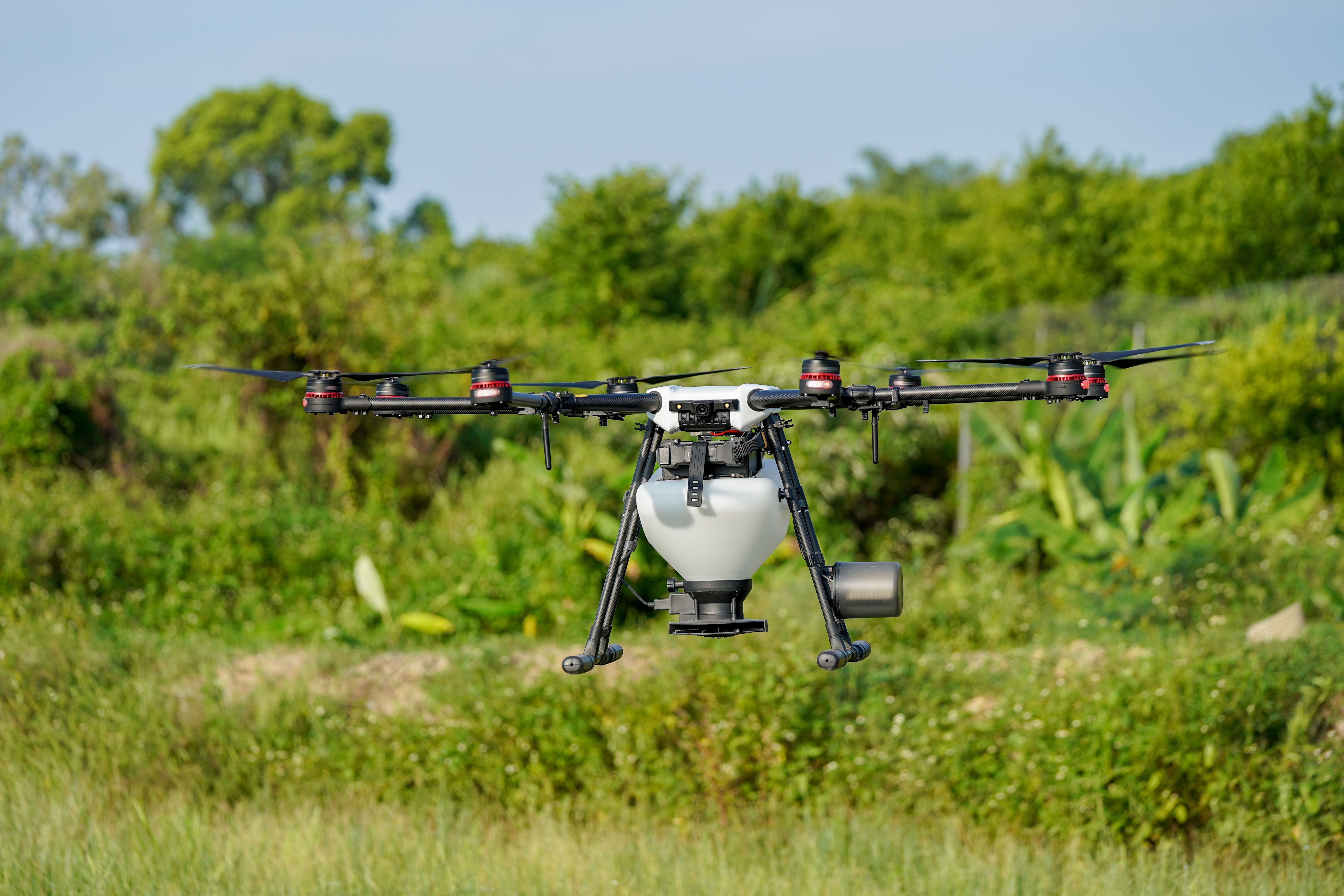 Flygrow agricultural drone in flight over green vegetation